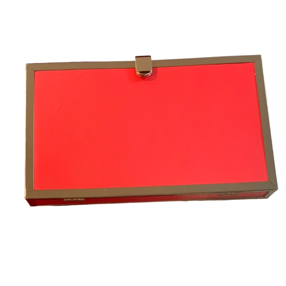 Red clutch with gold trimming